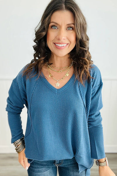 Trendy Women's Peacock Blue Long Sleeve V-Neck Top with Twisted Ribbed Design and Exposed Seams for a Chic Look