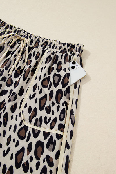 plus size women's khaki leopard print wide leg pants with drawstring pockets and exposed seams for chic comfort made for easy styling and wardrobe