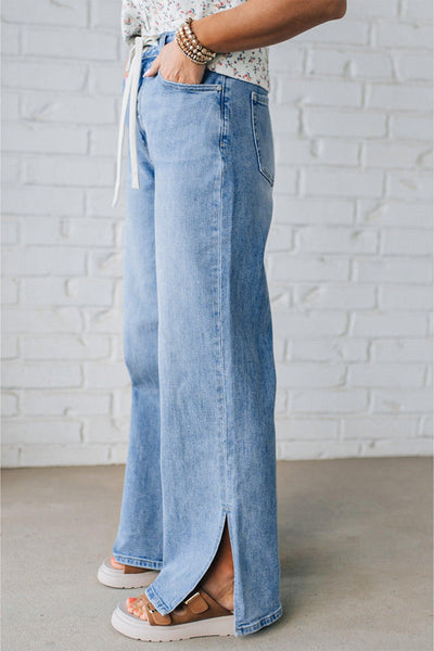 Trendy High-Waisted Women's Distressed Jeans with Slit Legs in Classic Blue for Effortless Everyday Style