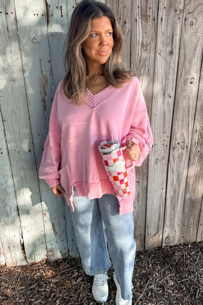 Casual Women's Pink Ribbed V-Neck Pullover Sweater with Raw Seams, Side Pockets, and Trendy Split Hem - Relaxed Fit