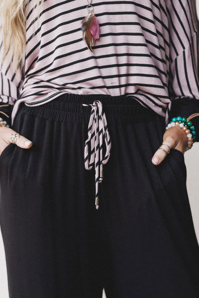Stylish Black Striped 2-Piece Women's Set: Relaxed Drop Shoulder Top with Ruffled Sleeves & Comfy Drawstring Pants