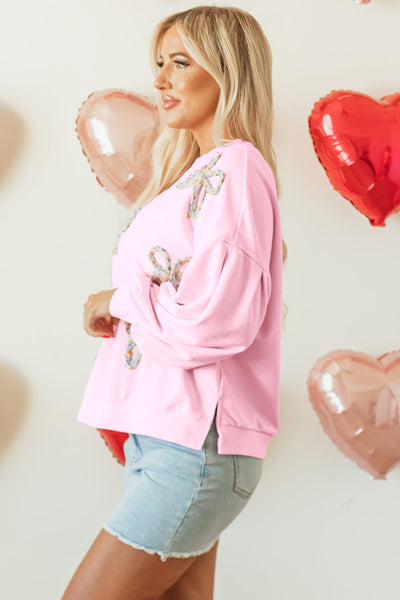 Cozy Light Pink Oversized Pullover Sweatshirt for Women with Embroidered Bow and Trendy Lantern Sleeves