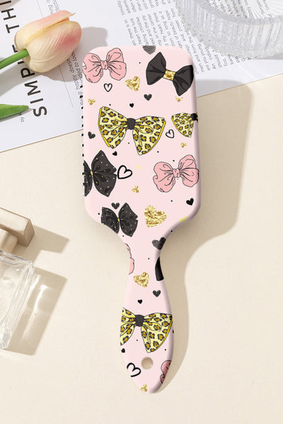 Women's Pink Leopard and Bow Print Detangling Paddle Hair Brush with practical styling and dependable silhouette control.