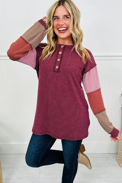 Chic Women's Red Color Block Long Sleeve Henley Top with Twisted Ribbed Design and Stylish Exposed Seams