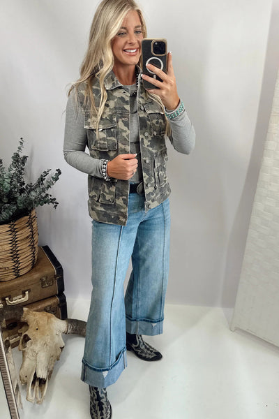Women's Casual Green Camouflage Denim Vest with Button Closure and Functional Cargo Pockets for a Trendy Look made for easy styling and wardrobe