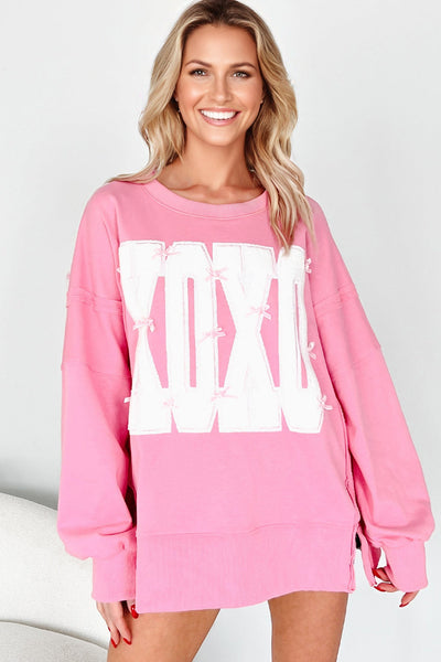 Trendy Women's Pink Bow Sequin XOXO Graphic Sweatshirt - Chic Baggy Fit with Exposed Seams for Casual Style