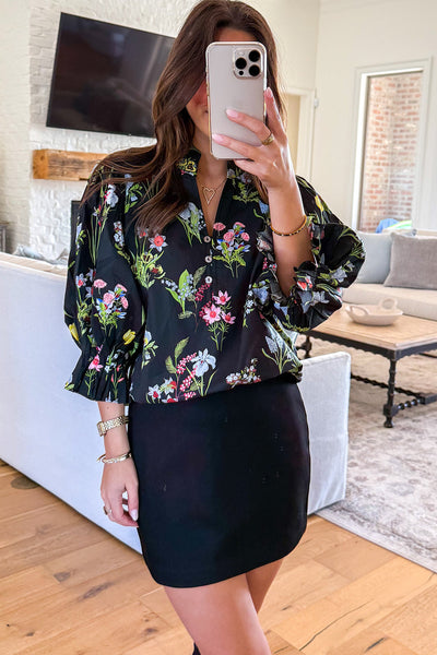 Women's Black Floral Print Blouse with Flounced Bracelet Sleeves and Half Button Detail for Effortless Style