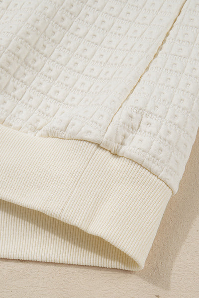 women's beige pineapple texture half-button pullover with puff sleeves made for easy styling and wardrobe coordination, with premium-like structure