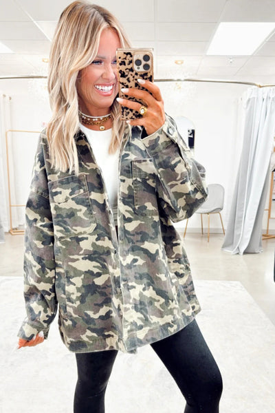 Stylish Women's Green Camo Loose Fit Jean Jacket with Chest Pockets for Effortless Casual Comfort made for easy styling and wardrobe coordination,