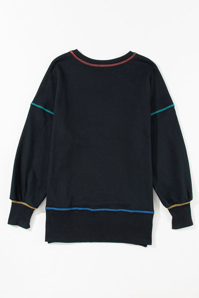 Cozy Women's Black Baggy Sweatshirt with Trendy Contrast Stitching and Chic Split Hem for Stylish Comfort