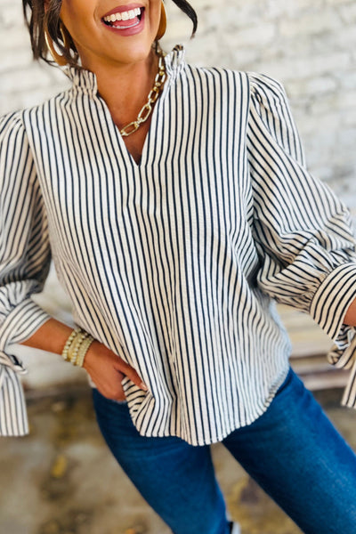 Elegant Women's Black and White Striped V-Neck Blouse with Knotted Cuffs Versatile Long Sleeve Top for Any Occasion
