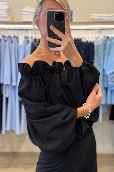 Elegant Women's Black Off-Shoulder Blouse with Frill Details and Knot Front, Long Sleeve Stylish Top for Any Occasion
