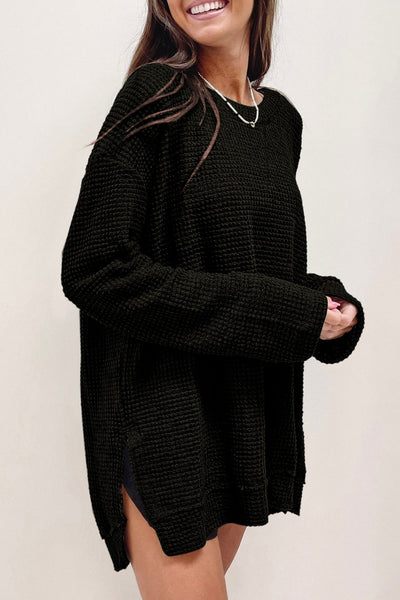 Chic Women's Black Oversized Waffle Knit Top with High Slits - Cozy and Stylish for Casual Outings and Everyday Wear