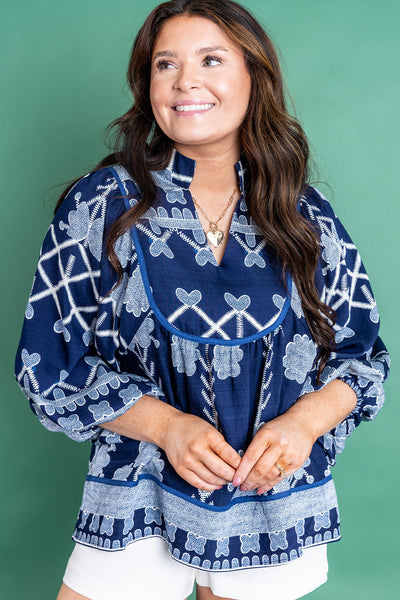 Plus Size Women's Blue Floral Blouse with Contrast Trim, Notched Neckline, and Long Sleeves for Effortless Chic Style