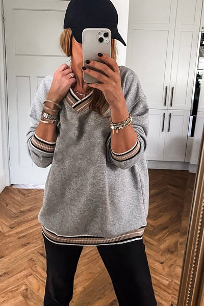 Trendy Women's Gray Varsity V-Neck Sweatshirt with Striped Trim - Stylish and Comfortable for Everyday Casual Wear