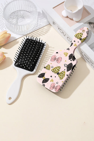 Women's Pink Leopard and Bow Print Detangling Paddle Hair Brush with practical styling and dependable silhouette control.