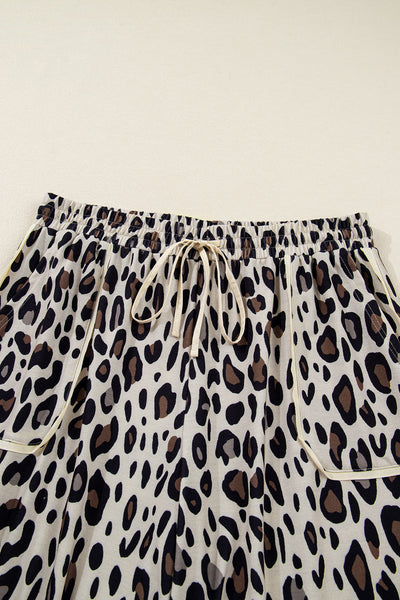 plus size women's khaki leopard print wide leg pants with drawstring pockets and exposed seams for chic comfort made for easy styling and wardrobe