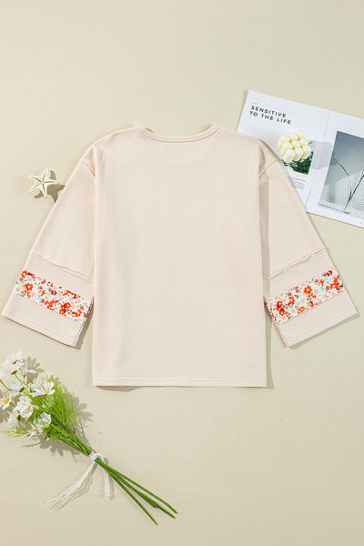 Women‚Äôs Beige Floral Graphic Blouse with Exposed Seams and Wide Sleeves - Perfect for Casual Chic Style