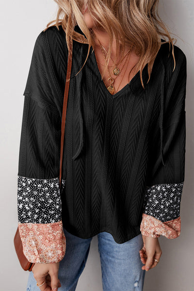 Chic Women's Black Floral Patchwork Knit Blouse - Textured V-Neck with Adjustable Drawstring for a Flattering Silhouette