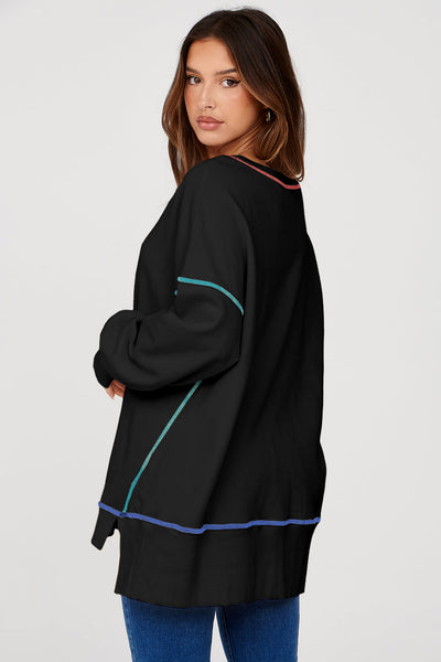 Cozy Women's Black Baggy Sweatshirt with Trendy Contrast Stitching and Chic Split Hem for Stylish Comfort