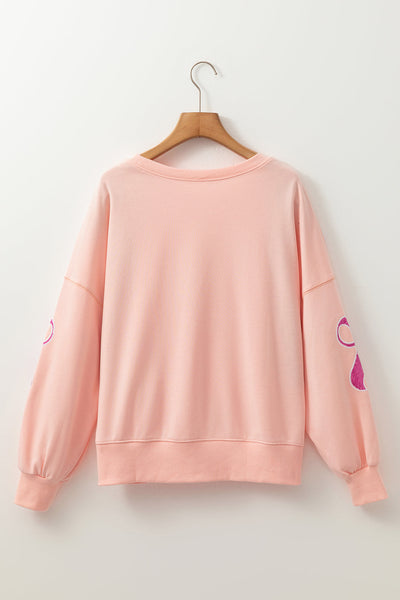 Trendy Oversized Apricot Pink Sweatshirt for Women with Sequined Bowknot - Stylish Comfort for Casual Wear