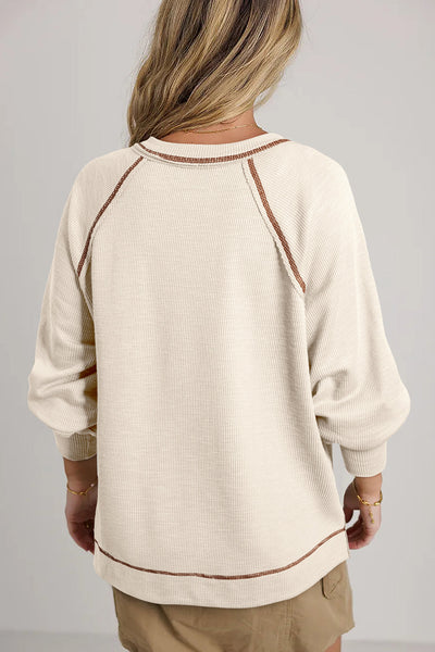 Women's Beige Textured Knit V-Neck Pullover Top with Exposed Seams Stylish, Cozy, Perfect for Casual Outings
