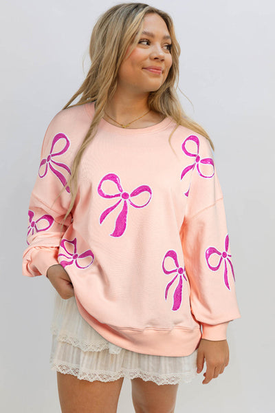 Trendy Oversized Apricot Pink Sweatshirt for Women with Sequined Bowknot - Stylish Comfort for Casual Wear