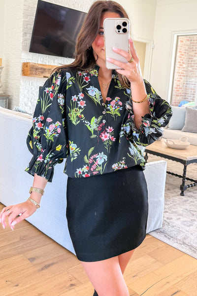 Women's Black Floral Print Blouse with Flounced Bracelet Sleeves and Half Button Detail for Effortless Style