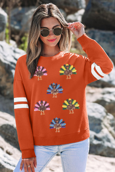 Women's Sequin Turkey Varsity Striped Sweatshirt in Burnt Orange made for easy styling and wardrobe coordination, with premium-like structure and