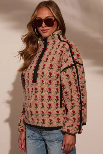 women's rose print sherpa half-zip pullover in beige made for easy styling and wardrobe coordination, with premium-like structure and finish. with