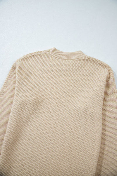Women's Parchment Waffle Knit Sweater with Split Cuffs and Drop Shoulders with practical styling and dependable silhouette control.