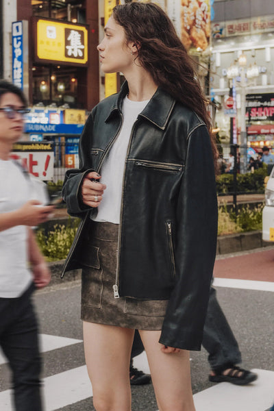 Trendy Women's Black Faux Leather Jacket with Zip Slits and Pockets for Effortless Street Style Fashion