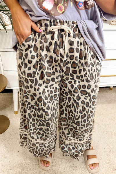 plus size women's khaki leopard print wide leg pants with drawstring pockets and exposed seams for chic comfort made for easy styling and wardrobe