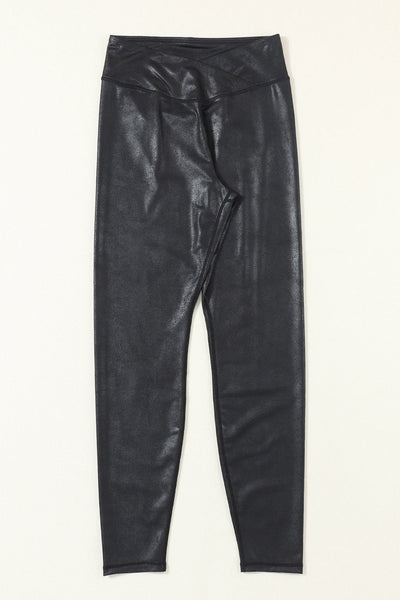 Chic Women's Black Leather Leggings with Crossed Dip Waist for a Stylish and Comfortable Fit