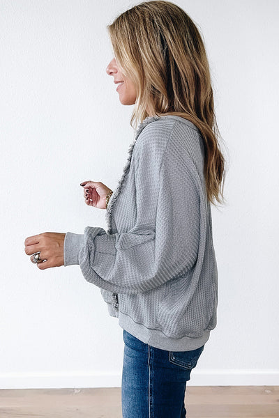 Women's Light Grey Waffle Knit Long Sleeve Pullover Top with Raw Hem and Patchwork Detail for Casual Comfort