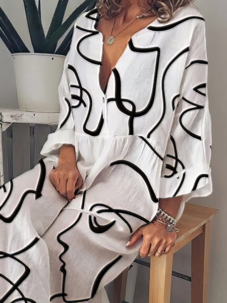 Contemporary Maxi Dress with Mesmerizing Abstract Face Print and V-Neckline