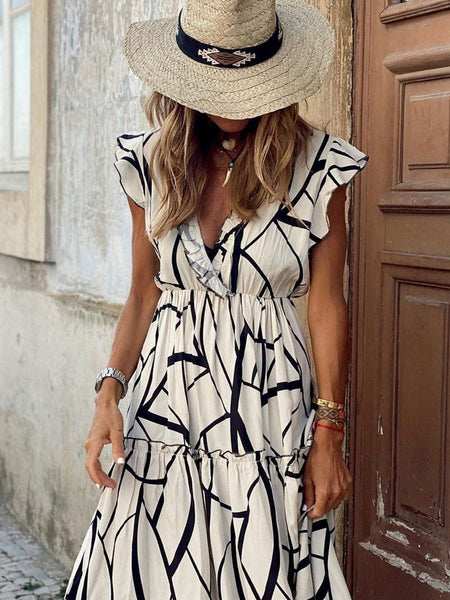 Contemporary Maxi Dress with Mesmerizing Abstract Face Print and V-Neckline