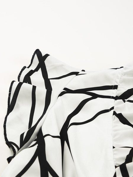 Contemporary Maxi Dress with Mesmerizing Abstract Face Print and V-Neckline