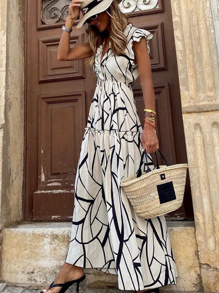 Contemporary Maxi Dress with Mesmerizing Abstract Face Print and V-Neckline