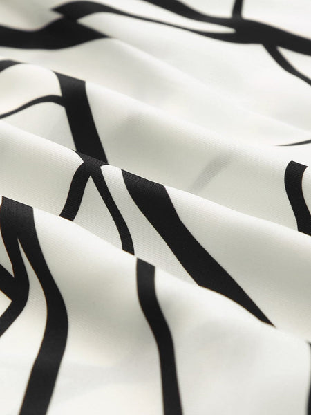 Contemporary Maxi Dress with Mesmerizing Abstract Face Print and V-Neckline