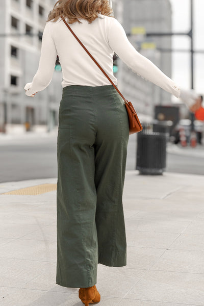 Stylish Women's White Slim Fit Sweater with Button Cuffs and Round Neck for Trendy Layering in Any Season