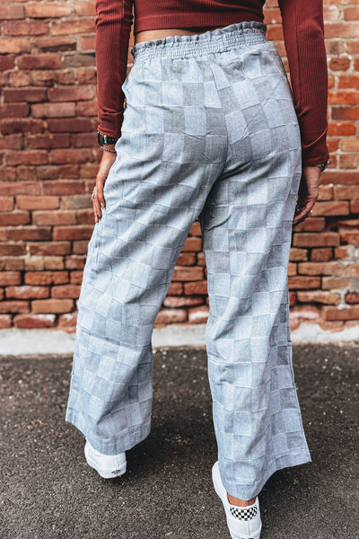 Stylish Women's Sky Blue Loose Denim Pants with Frills, Elastic Waist, and Checkered Design for Comfort and Versatility