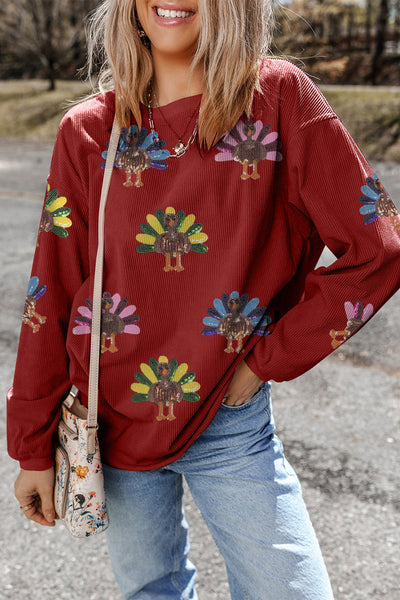 Women's Racing Red Corduroy Turkey Graphic Oversized Sweatshirt made for easy styling and wardrobe coordination, with premium-like structure and