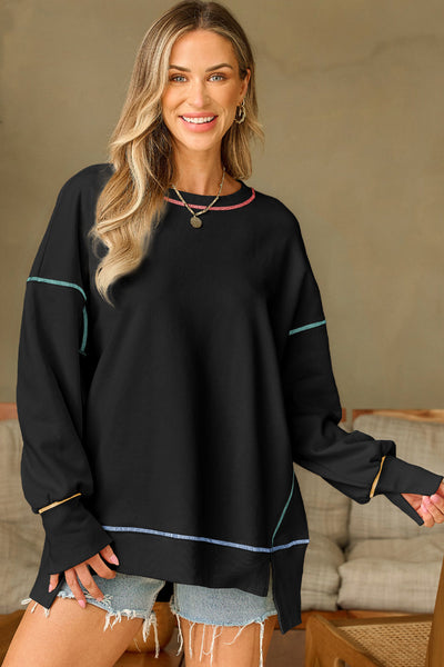Cozy Women's Black Baggy Sweatshirt with Trendy Contrast Stitching and Chic Split Hem for Stylish Comfort