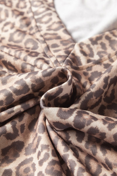 Women's Light French Beige Leopard V-Neck Pullover and Mini Skirt Set with practical styling and dependable silhouette control.