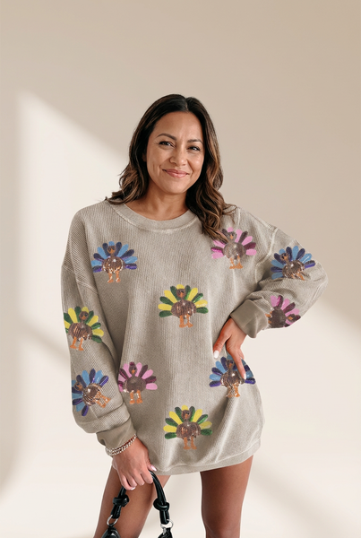 Women's Sequin Turkey Corded Oversized Sweatshirt in Smoke Gray made for easy styling and wardrobe coordination, with premium-like structure and