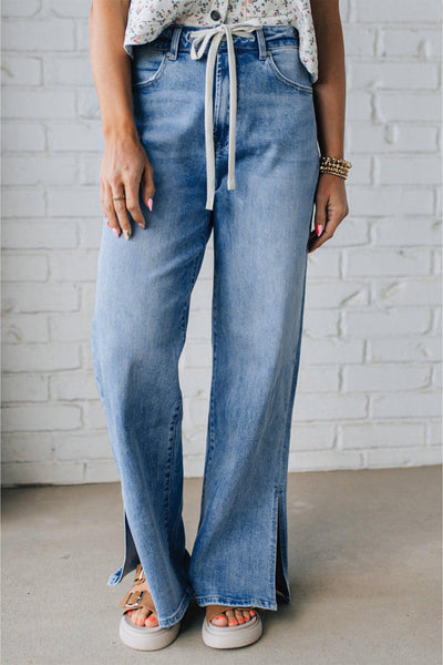 Trendy High-Waisted Women's Distressed Jeans with Slit Legs in Classic Blue for Effortless Everyday Style