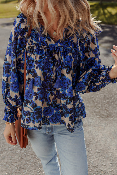 Chic Women's Blue Floral Blouse with Tassel Tie Neck, Ruffle Trim, and Long Puff Sleeves for Effortless Style