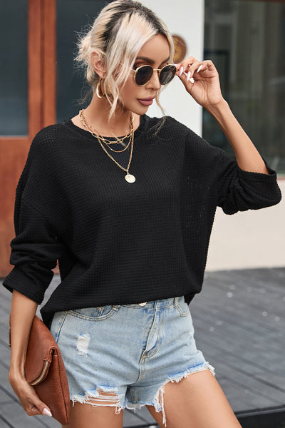 Chic Women's Black Oversized Waffle Knit Top with High Slits - Cozy and Stylish for Casual Outings and Everyday Wear