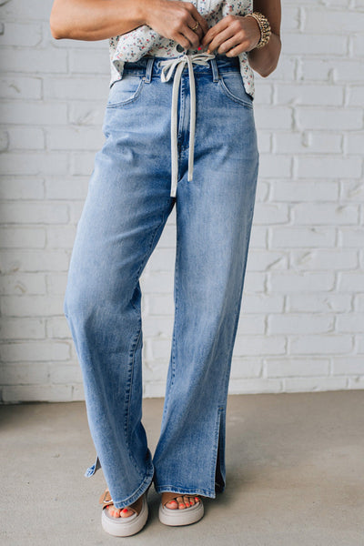 Trendy High-Waisted Women's Distressed Jeans with Slit Legs in Classic Blue for Effortless Everyday Style